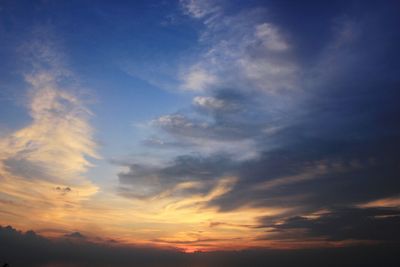 Low angle view of dramatic sky during sunset