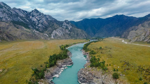 Mountain turquoise river, rocky banks aerial view. rugged rea for rafting  katun river, altai.