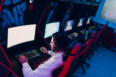 High angle view of man playing video game