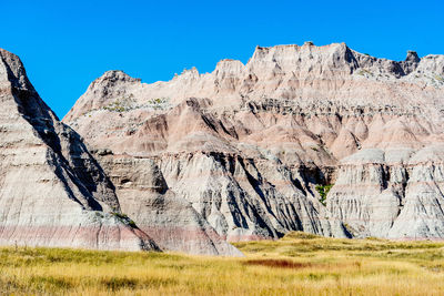 Scenic view of rocky mountains against sky