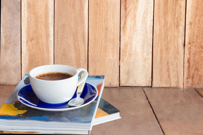 Coffee cup on table