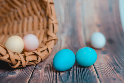 Close-up of eggs in basket on table