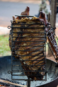 Close-up of meat on barbecue grill