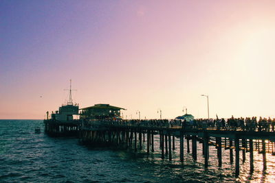 Scenic view of sea against clear sky during sunset