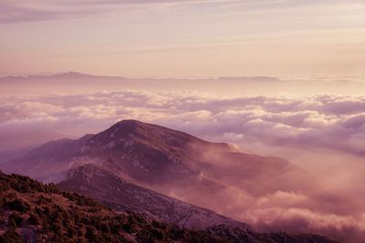 Scenic view of mountains against sky during sunset