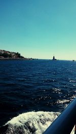 Scenic view of sea against clear blue sky