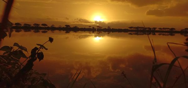 Scenic view of sunset against sky