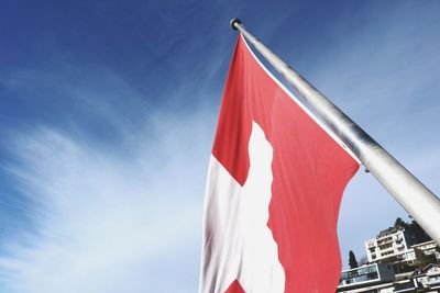 Low angle view of flag against sky