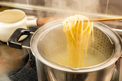 High angle view of rice in cooking pan