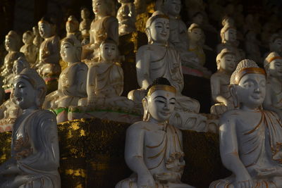 Buddha statue in temple outside building