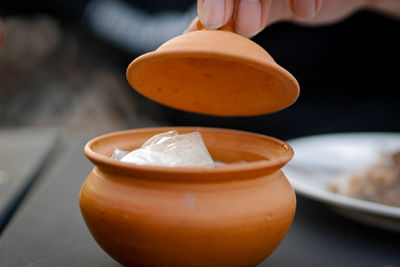 Close-up of person preparing food