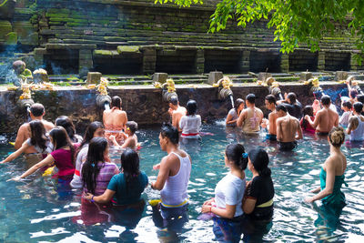 Group of people at swimming pool