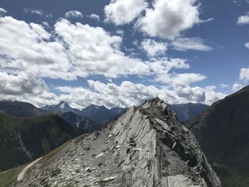 Panoramic view of mountain range against sky