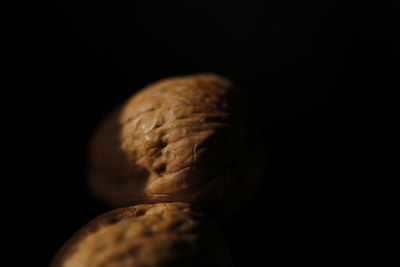 Close-up of ice cream over black background