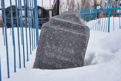 Close-up of snow covered fence