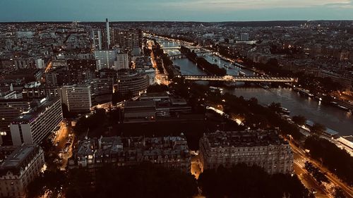 High angle view of illuminated buildings in city at night