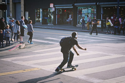 Woman standing on city street