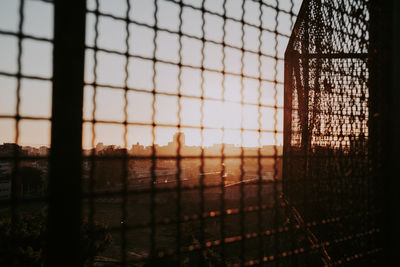 Scenic view of sunset seen through window