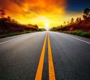 Empty road at sunset