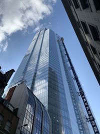 Low angle view of modern buildings against sky