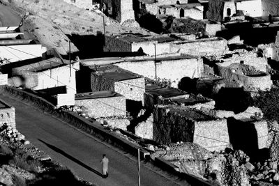 High angle view of railroad tracks amidst buildings