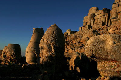 Rock formations against blue sky