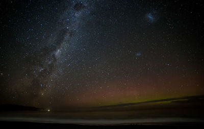 Scenic view of star field against sky at night