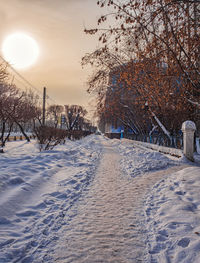 Winter inhabited city streets on cold morning. harsh climate. low temperature. sunny winter morning