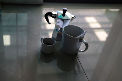 High angle view of coffee cup on table