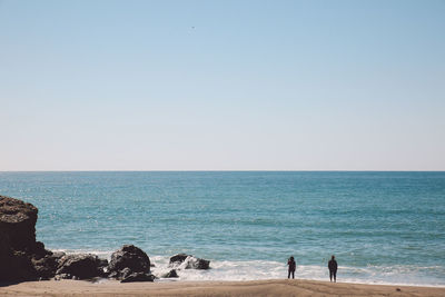 Scenic view of sea against clear sky