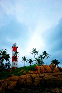 Low angle view of road sign against sky