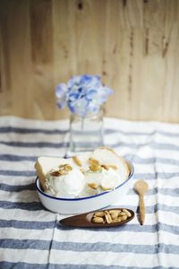 Close-up of dessert served in container on table