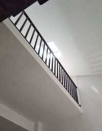 Low angle view of illuminated staircase in building