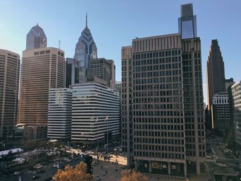 Modern buildings against sky in city