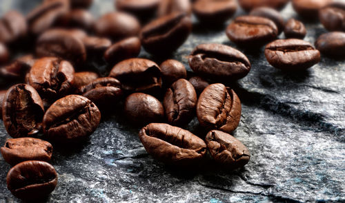 Close-up of coffee beans on table