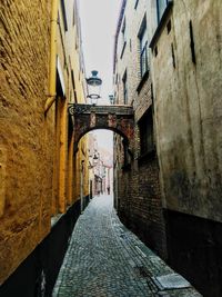 Narrow alley along buildings