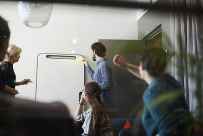 Business colleagues in board room during meeting at creative office