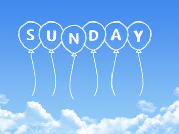 Low angle view of text on blue sky