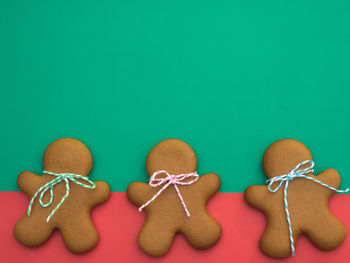 Close-up of cookies on table against blue background