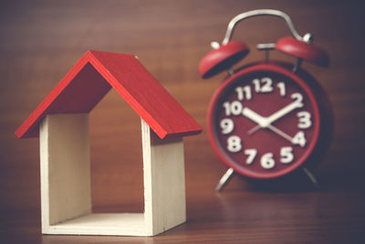Close-up of clock on table