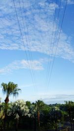Low angle view of electricity pylon against sky