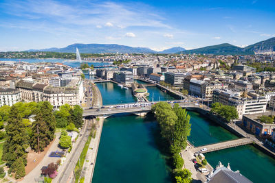 High angle view of river amidst buildings in city