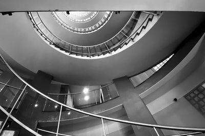 Low angle view of spiral staircase in building