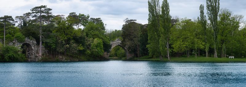 Panorama of the park in laxenburg with beautiful stone bridges and lake, austria