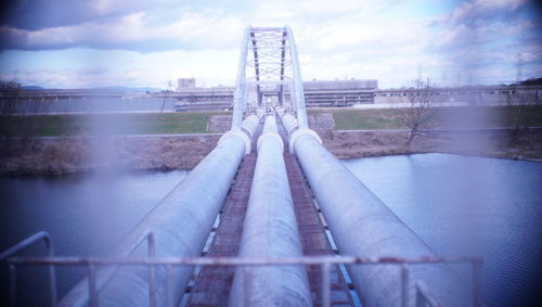 Smoke stacks against sky