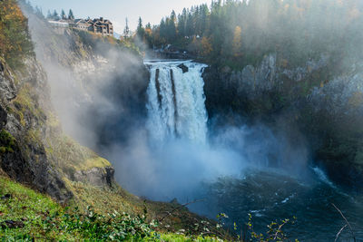 A blanked of mist obscures snoqualmie falls in washington state.