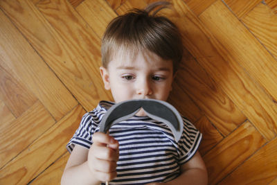 Portrait of cute baby boy at home