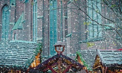 Full frame shot of building in city during snowfall