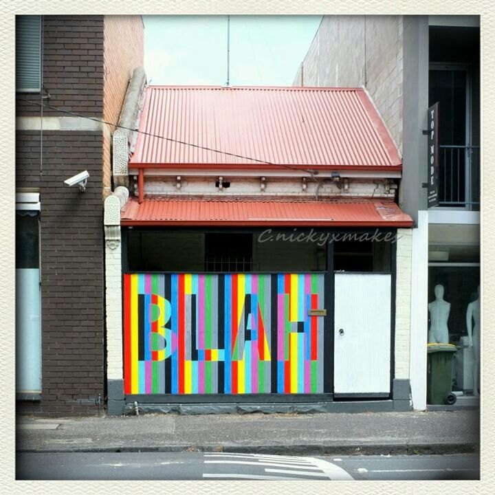 building exterior, architecture, built structure, transfer print, auto post production filter, red, door, city, text, multi colored, facade, entrance, outdoors, closed, western script, building, day, communication, low angle view, window