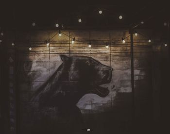 Digital composite image of woman standing by window